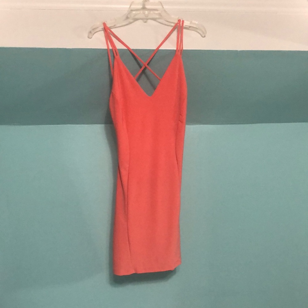 Sexy dress, salmon pink color, size M. Spandex